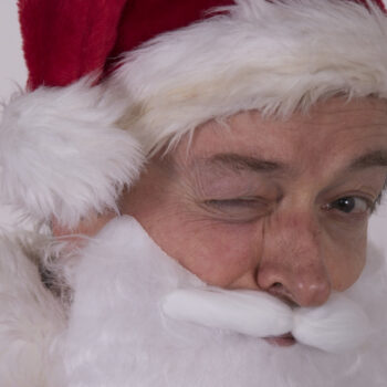 Weihnachtsmann mit Augenzwinkern